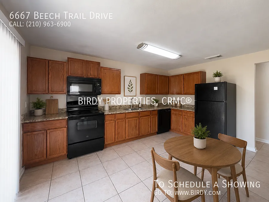 "Charming 3-Bedroom Retreat with Granite Touches at 6667 Beech Trail Drive!" — Photo 4