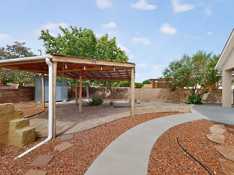 The backyard is an entertainers dream with a full covered patio plus a bonus storage shed for all of your storage needs.