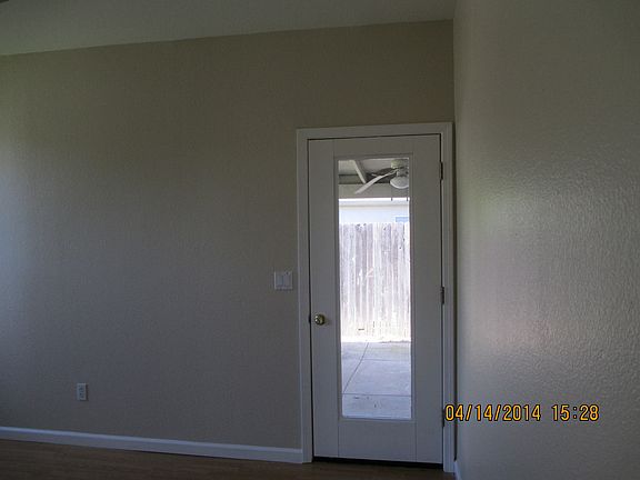 master bedroom has door to covered patio