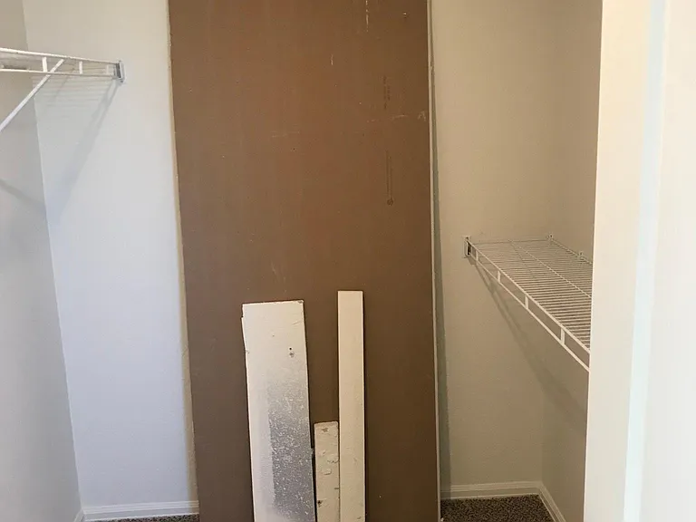 walk-in closet in primary bedroom