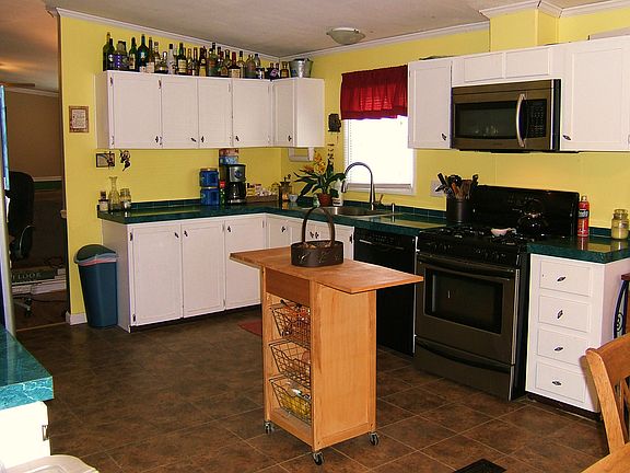 Kitchen: tile floors, pantry