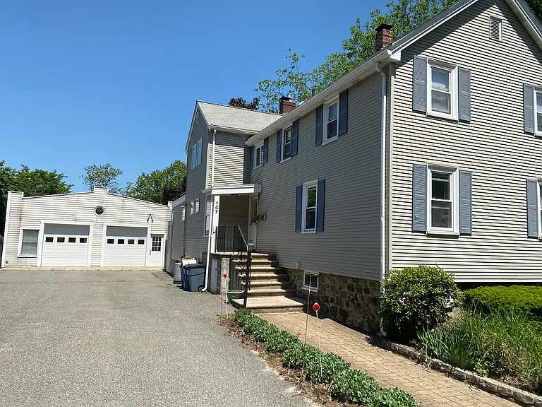 View from the street with garage (one garage parking included)
