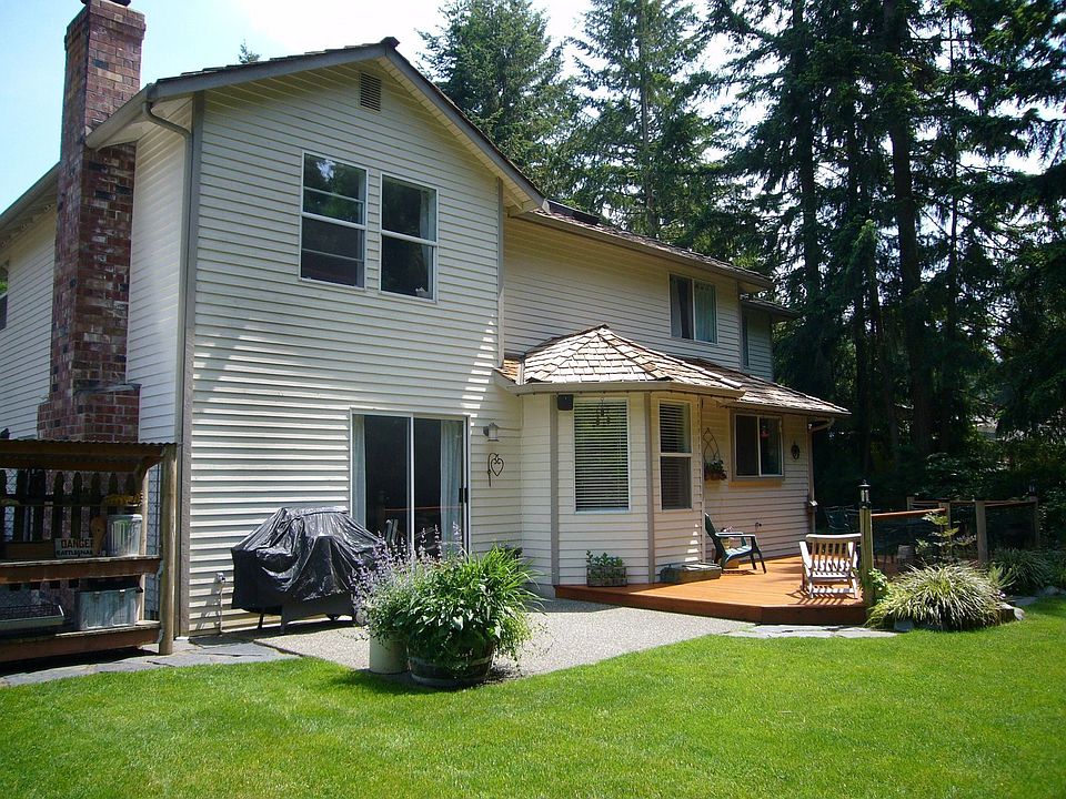 Over 1/3 acre of private, mature landscaped yard