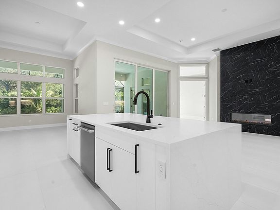 Kitchen to Great Room Dining Oceanic Grande Move-in Ready shown for reference