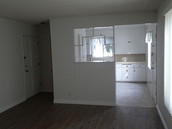 Entry door, kitchen entry and living room