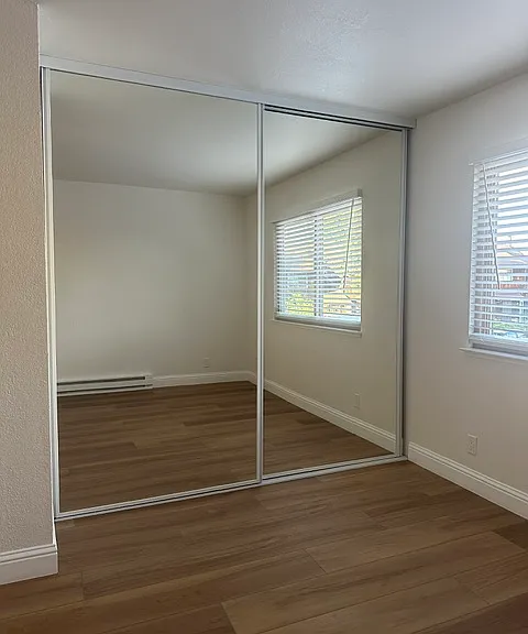 Second bedroom mirrored closet doors