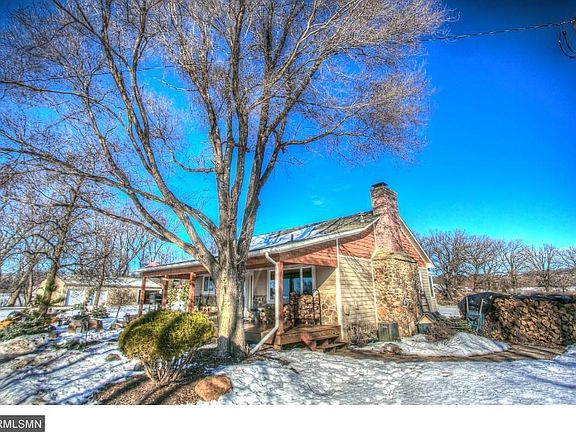 Great location. New front porch and rap-around deck. Front of home faces south.