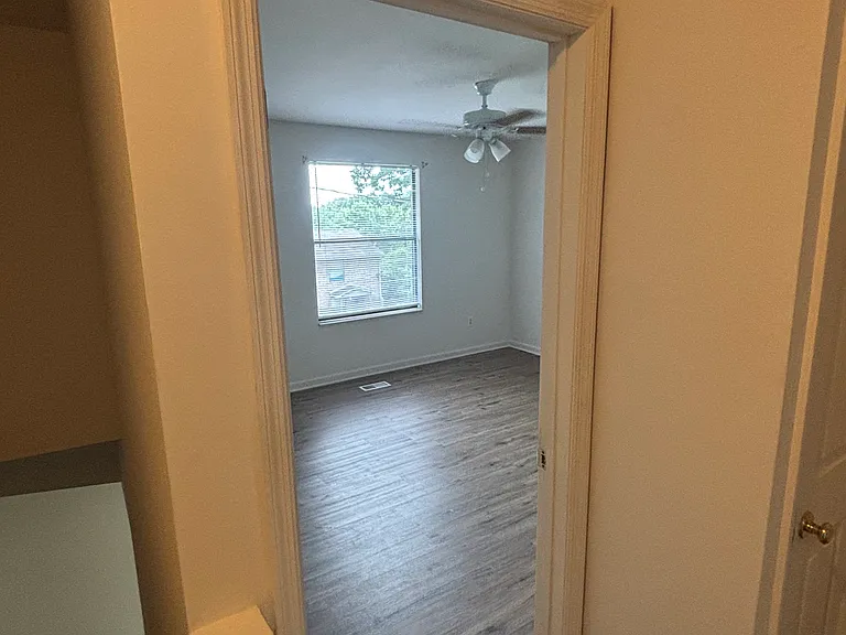 View of master bedroom from the top of the steps