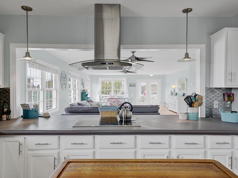 Kitchen with pass through breakfast bar