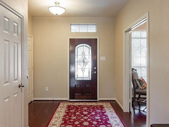 View of front entryway from the living room.