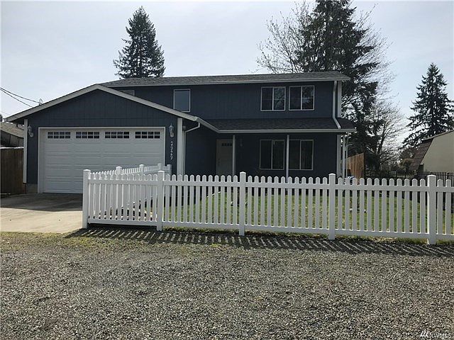 Meticulously cared for Adair home with a little over 2,000 sf. Extra parking for guests!