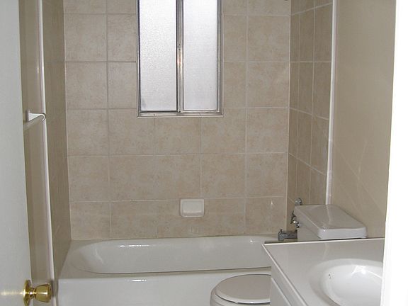 tile on floor and around tub