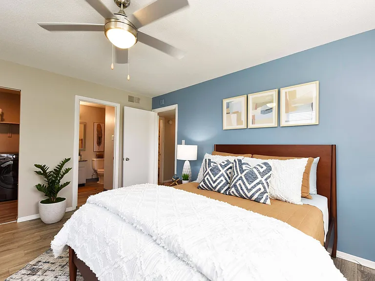Bedroom with hardwood-style flooring