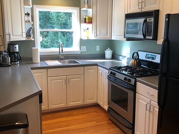 Modern kitchen with tons of cabinet space and natural light.