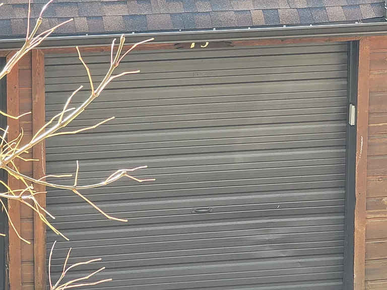 Single car garage across from unit