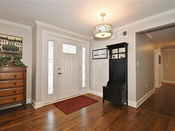 Beautiful hardwoods throughout the first floor. Step into the open floor plan from the covered front porch.