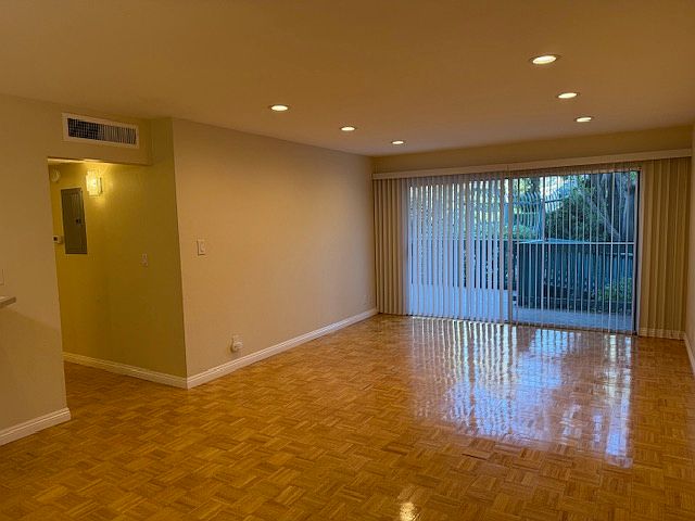 Living room opens to balcony