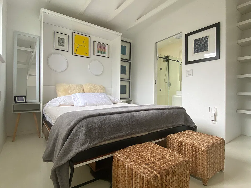 Solid wood pocket door for space efficiency