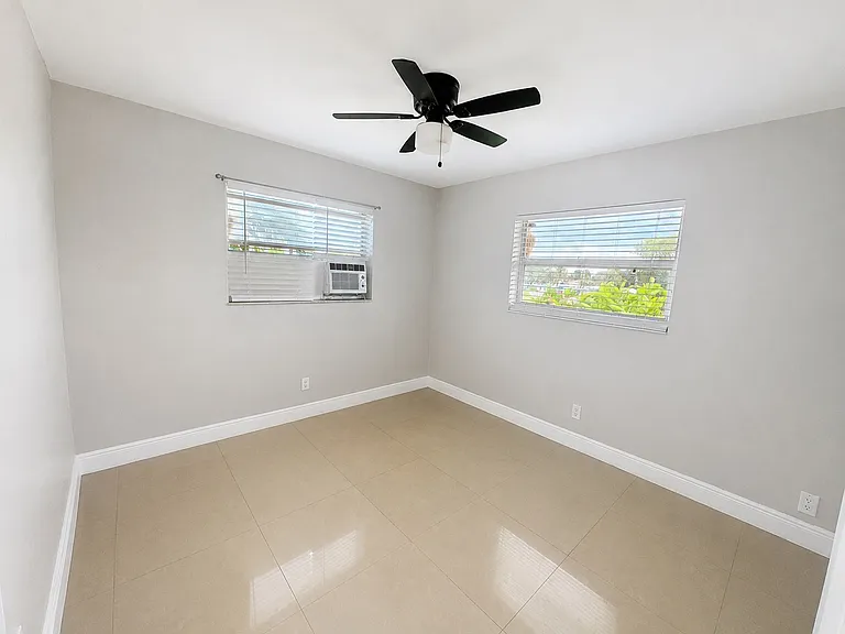 09 - Bedroom 1 - Window Angle with Ceiling Fan