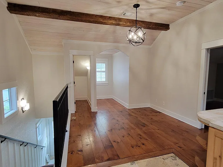 Main Living Area Carriage Apartment, Vaulted Ceilings with Beams, Hardwood Floors