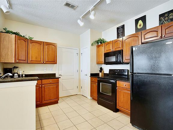 4th image of 5255 Cane Island Loop APT 204