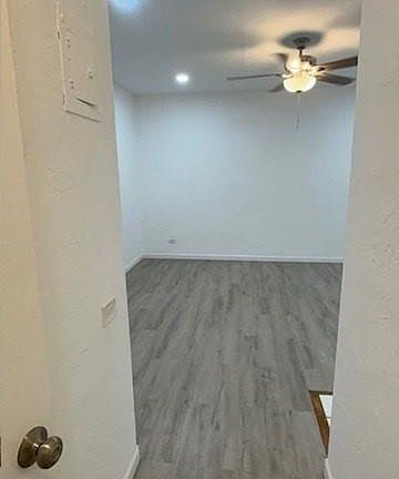 Very Large Living Room - wood panel floors, ceiling lighting, remodeled