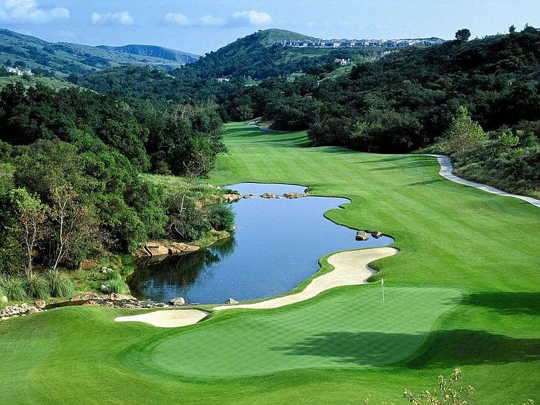 Dove Canyon Golf Club course runs through beautifully landscaped neighborhood.