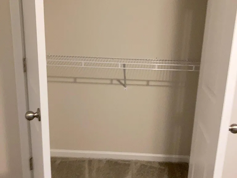 Closet in secondary bedroom.