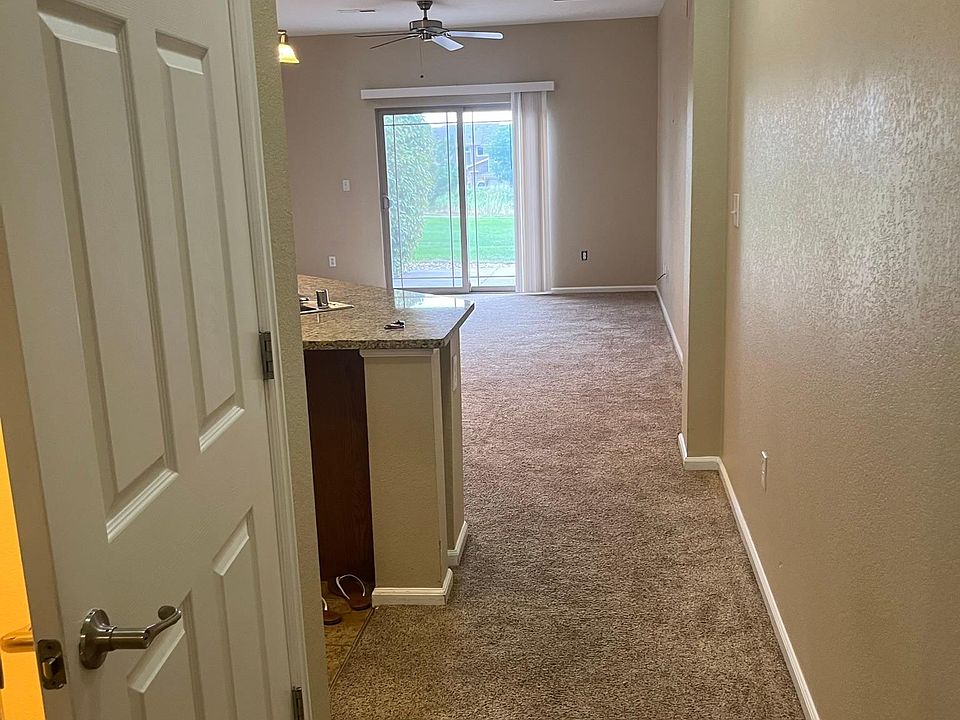 View from entry to kitchen and living room