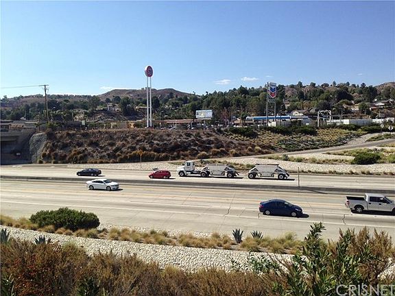 View of listed property from across the freeway.