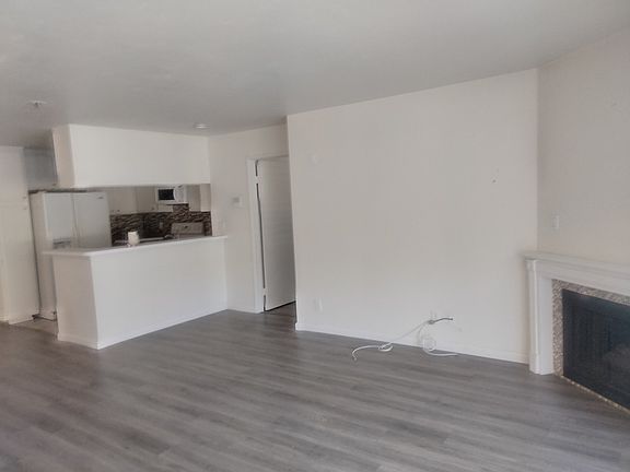 Living Room - fireplace, kitchen
