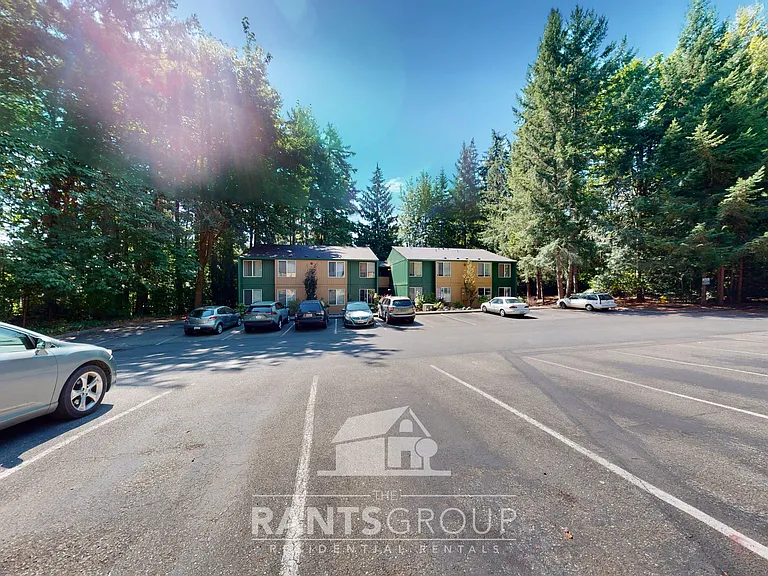 Lovely, wooded 2-bedroom apartment with a large private deck and in-unit washer & dryer! — Photo 1