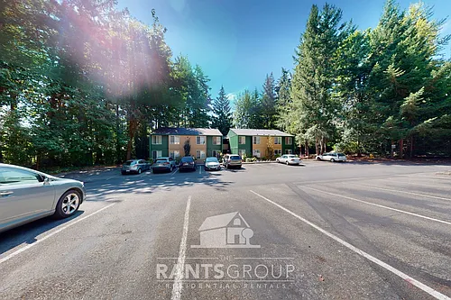 Lovely, wooded 2-bedroom apartment with a large private deck and in-unit washer & dryer! Photo 1