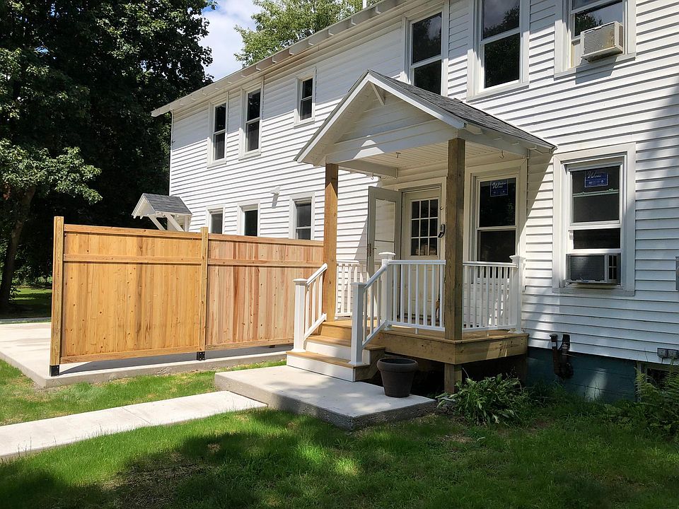 New covered porch at side entry.