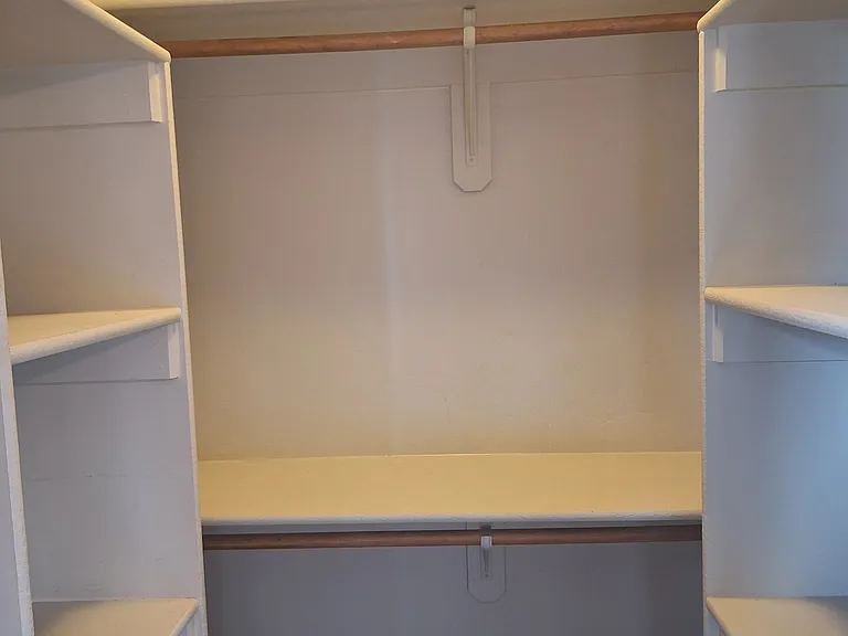 Master bedroom walk in closet.