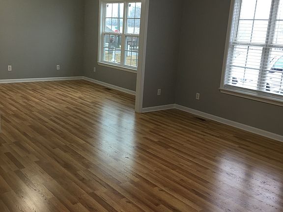 Living room and adjacent den
