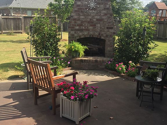 Patio with fireplace