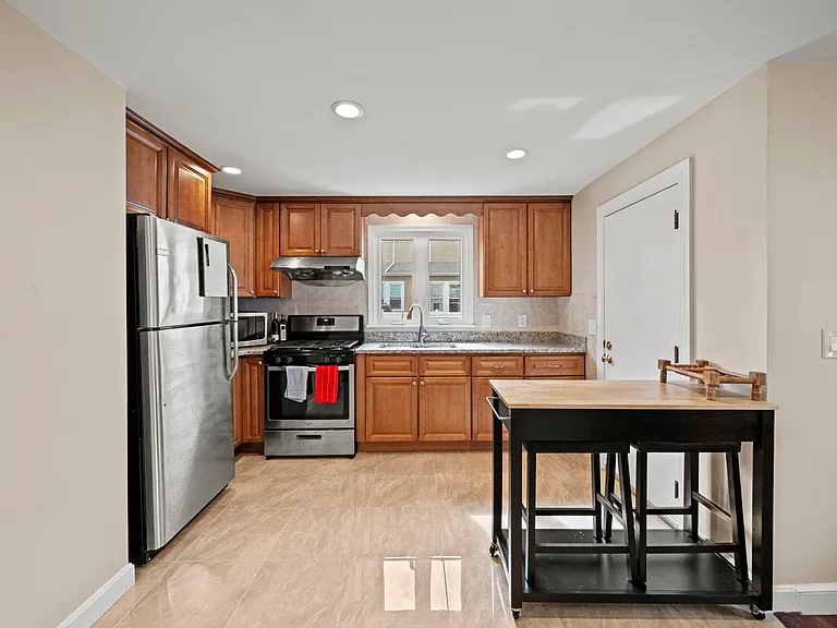 Kitchen cart included or can be stored in the basement.