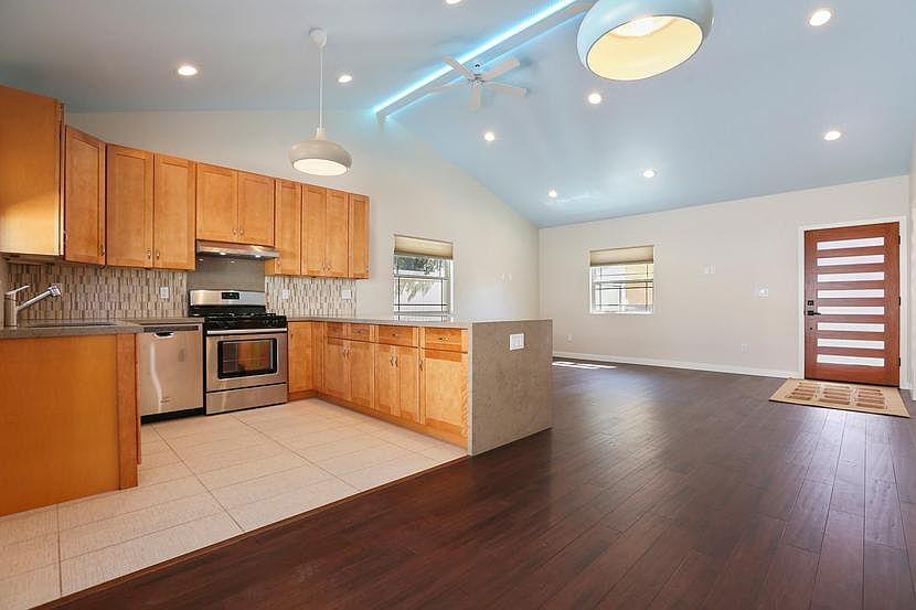 Open concept kitchen, dining area and living room