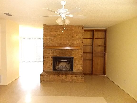 Livingroom fireplace and built in bookcase