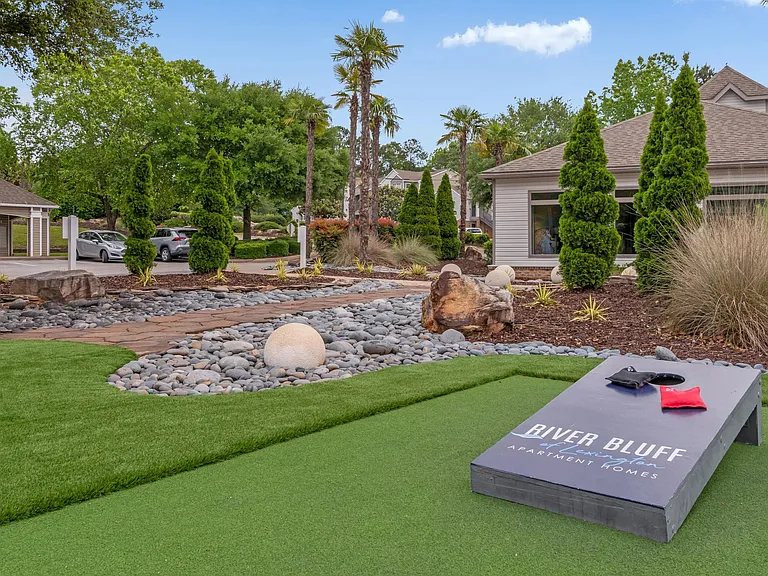 Partake in a lively match at our cornhole court inviting neighborly fun and friendly competition.