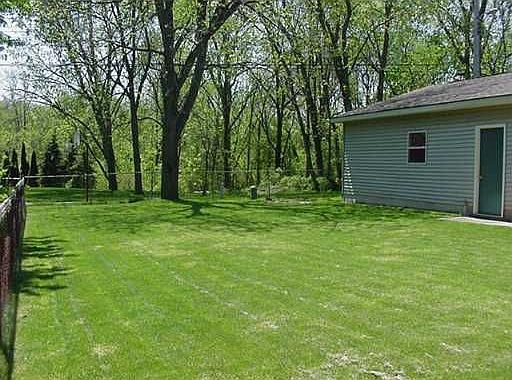 Fenced park like back yard