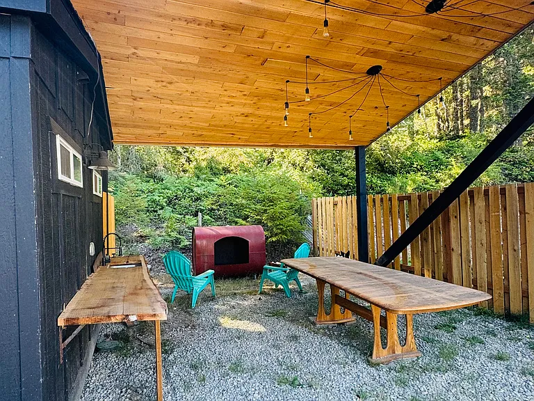 Outdoor covered area ceiling has light feature