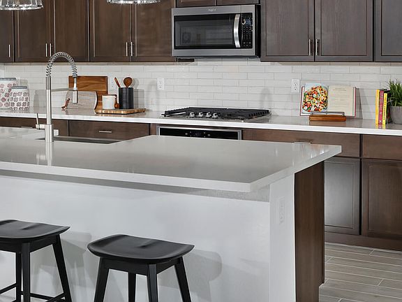 Prep a meal at the large kitchen island.