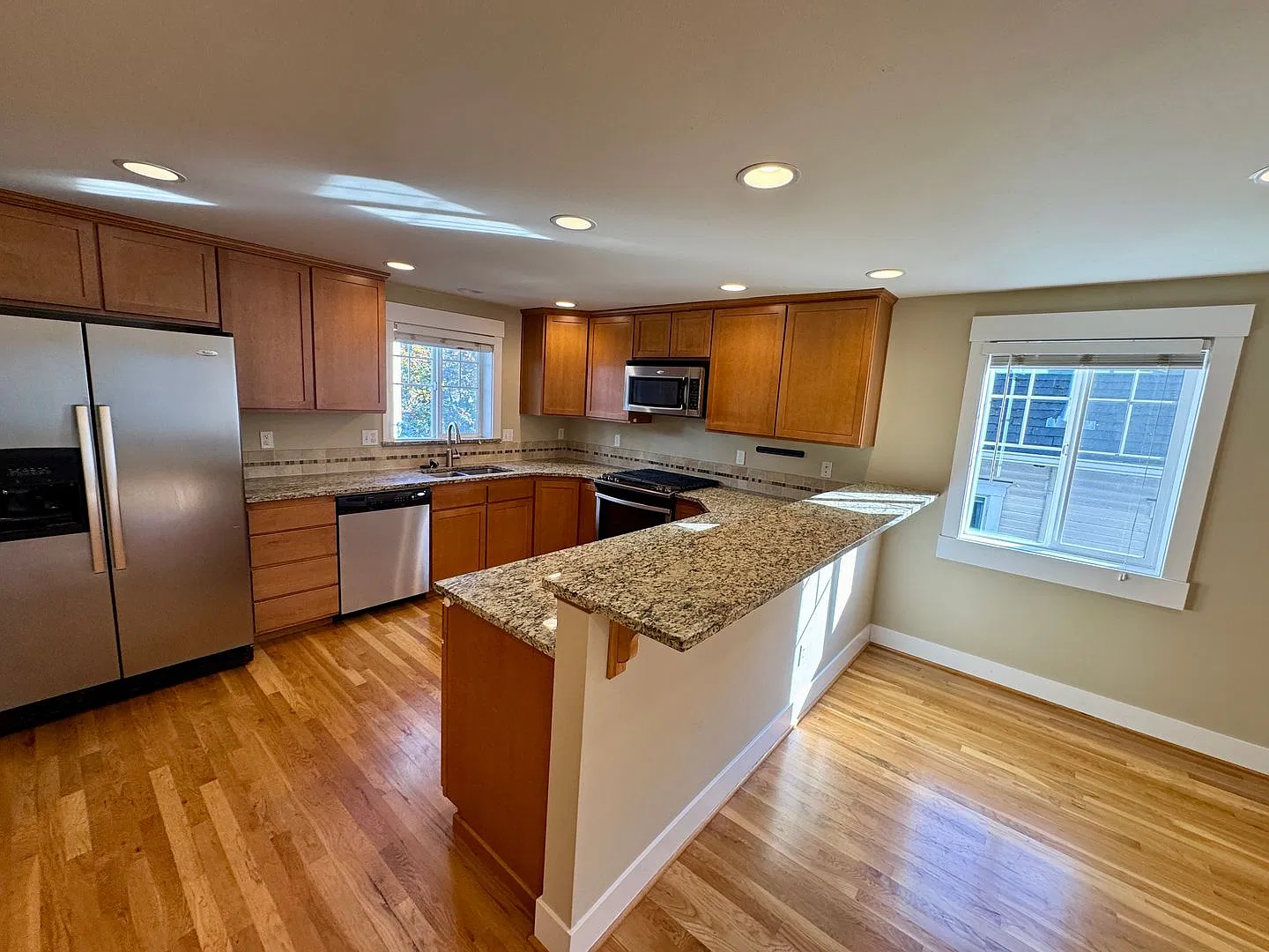 Updated Central District Townhouse with Attached Garage & Private Yard! — Photo 3