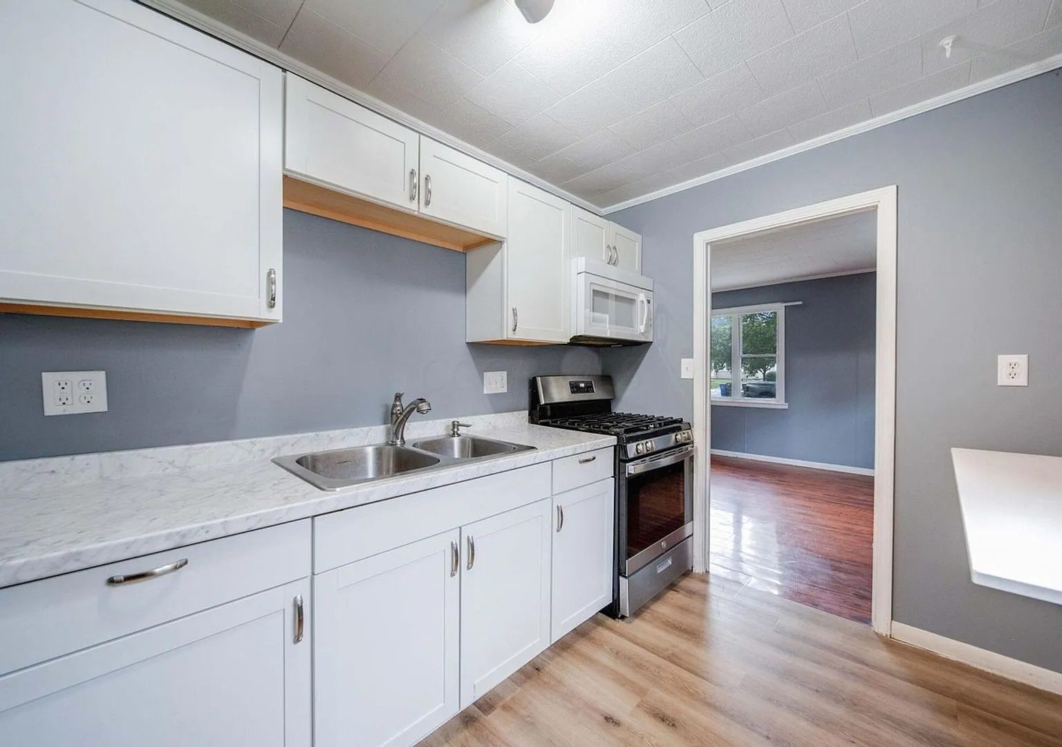 Affordable 3-Bedroom Home with Covered Patio & Renovated Kitchen Don't Miss Out! — Photo 2