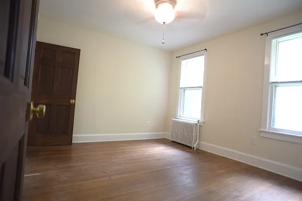 Second Bedroom with its own toilet sink and closet. Newly painted.