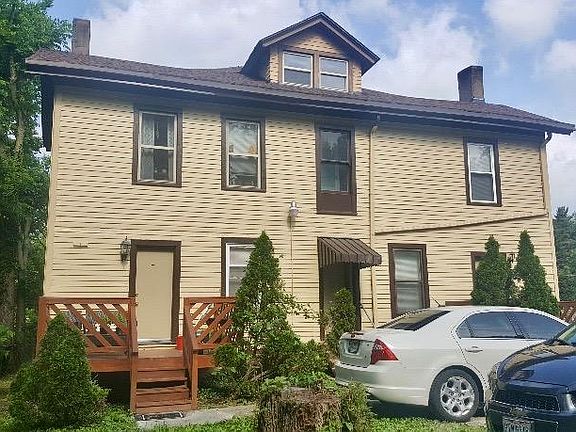 Back of the building with parking