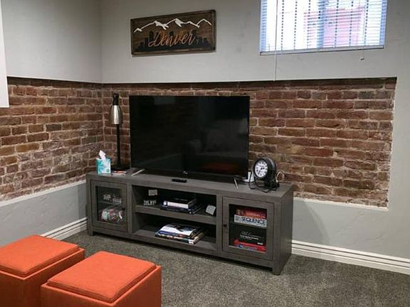 Living area with TV and queen pull out couch