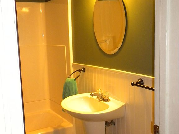 bathroom renovated in 2009 pedestal sink, water efficient toilet, new tub